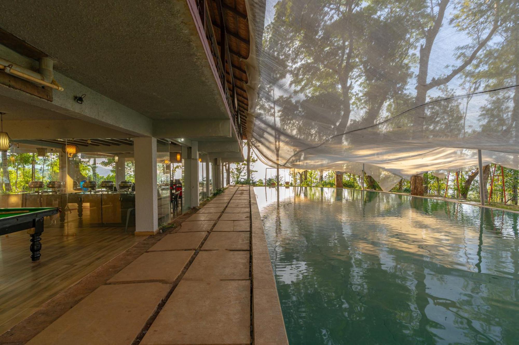 Q Swarga Retreat Hotel Attigundi Exterior photo