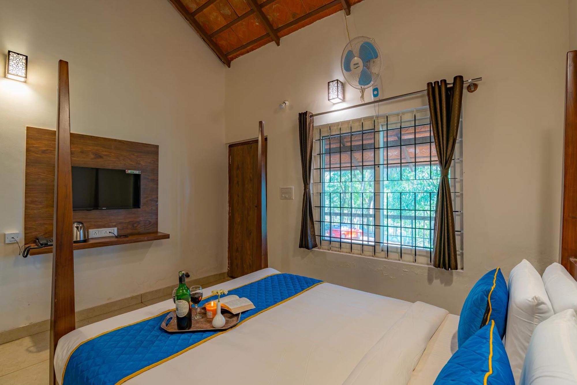 Q Swarga Retreat Hotel Attigundi Exterior photo